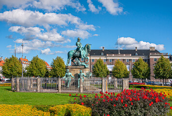 Copenhagen, Denmark - September 13, 2010: Green bronze equestrian statue group of King Christian V...