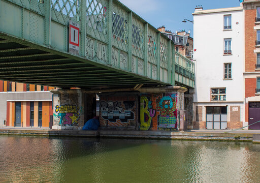 Paris, France - 05 22 2023 : street art le long du canal de l'Ourcq dans le 19ème arrondissement de Paris 