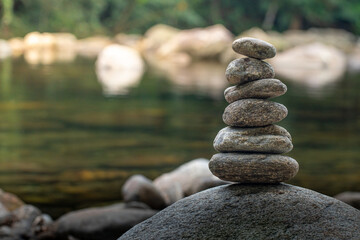 Rocks balanced in waterfall. Zen balance and meditation