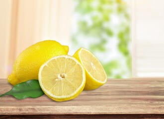 Whole and sliced juicy lemon fruit