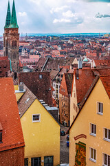Naklejka na ściany i meble View of Nuremberg Old Town, the Historic Centre and the towers of the St. Lawrence, Church from Kaiser Castle. Bavaria, Germany, 2018