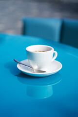 Coffee Break on Blue: Enjoy a Moment of Calm with a Warm Cup of Coffee