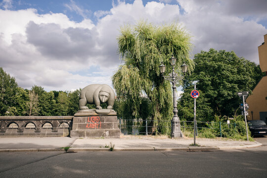 Statue of a fat bear at the bridge, in Tiergarten, Berlin, Germany - may 2023