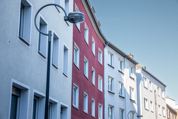 Typical residetial street with multistorey modern residential buildings in a suburban street of...