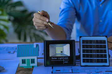 A conference for engineers and developers of renewable energy systems with solar panels and desktop...