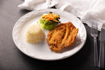 Chicken Milanese. Delicious crispy, quick and easy recipe, made with thin skinless and boneless chicken breasts or cutlets, lightly breaded and deep fried.