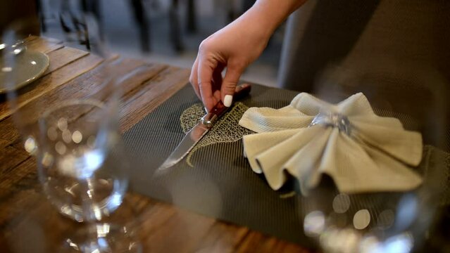 Close-up view - setting a fancy restaurant table