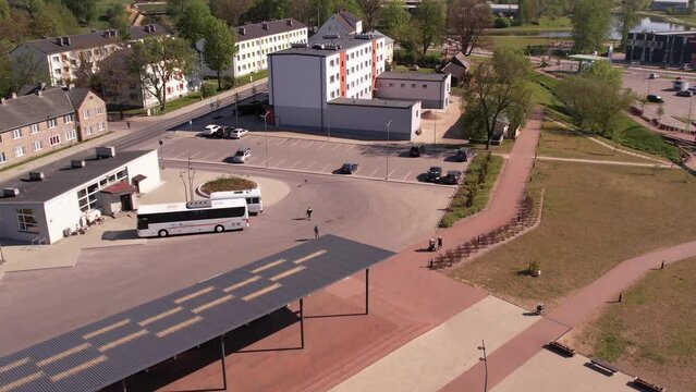 A small border town in Latvia. Valka city at sunset. Drone flight over the city