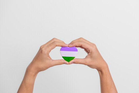Queer Pride Day and LGBT pride month concept. purple, white and green heart shape for Lesbian, Gay, Bisexual, Transgender, genderqueer and Pansexual community