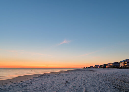 Sunset over white sand beach, Mexico Beach Florida