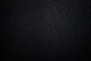 Dark background with asphalt surface texture