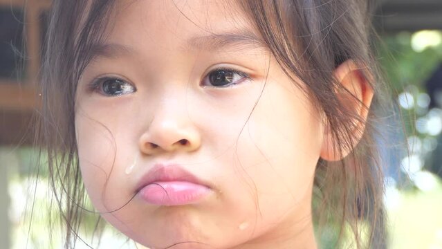 Beautiful little girl asia crying