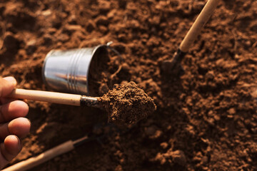 Farmers use shovels to till the soil in agriculture, loose soil.