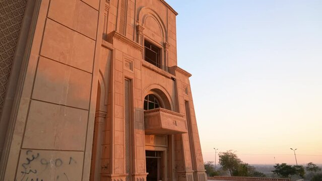 Exterior of abandoned Palace of Saddam Hussein overlooking Babylon, Iraq. Low angle