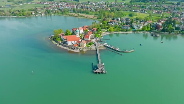 The moated castle peninsula on Lake Constance with the baroque church of St. George, jetty and marina, Lindau district, Swabia, Bavaria, Germany, Europe