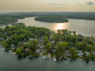 Late afternoon aerial photo of Lake Mahopac located in Town of Carmel, Putnam County, New York.	