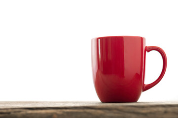 Red Mug on wood table with Copy space.