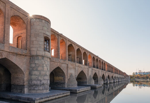 Si-o-Se Pol (Bridge of 33 Arches or Allahverdi Khan Bridge) on Zayanderud River in Isfahan, Iran. Architectural masterpiece and historical heritage. Tourist attraction.