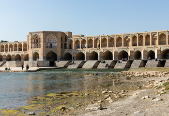 Historic Khaju Bridge (Pol-e Khajoo) on Zayanderud River in Isfahan, Iran. Heritage and tourist attraction.
