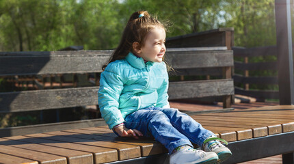 Beautiful little girl playing outdoor