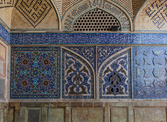 Old tiles on walls of Jameh or Jame Mosque (also Atig or Friday Mosque), Iran's oldest mosque in Isfahan, Iran. UNESCO World Heritage.