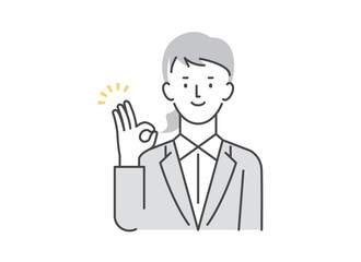 OKポーズをするビジネスマン女性