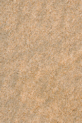Sand dune view from above. Pile of sand from a bird's eye view. Waves of sand.