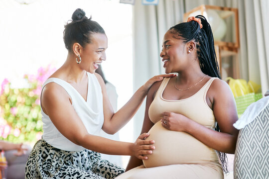 Pregnant, friends and woman touching a stomach, baby shower and excited with happiness, home and support. Female people, girls and lady feeling belly, pregnancy and event with celebration and party