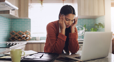 Freelance, headache and female on laptop in kitchen frustrated, anxiety and internet delay in her home. Remote work, stress and lady freelancer with migraine, 404 or online problem, glitch or report