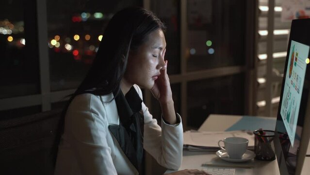 Businesswoman hard working to late night and work overtime at office. Manager assigns task after timeout of work. Concept of business management, assignment job late and working overtime.