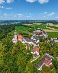 Fototapeta na wymiar Kloster Andechs im Fünfseenland in Oberbayern im Luftbild 