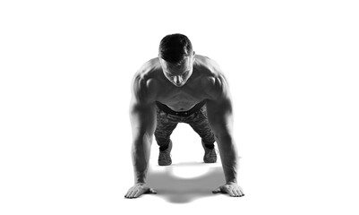 Sport. Handsome young man doing exercise