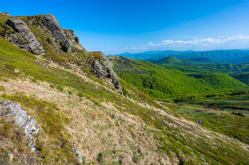 Obraz premium Spring landscape of the Bieszczady Mountains. A view of the Mount Kopa Bukowska.