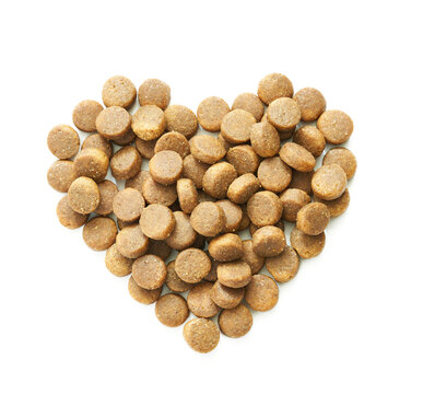 top view overhead pet dog cat food kibble feed pellet isolated on white background. heart pet dog cat food kibble feed pellet isolated. heap of pet dog cat food kibble feed pellet isolated heart