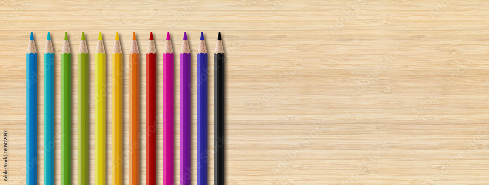 Poster Colored pencil group isolated on wooden background. Panoramic banner background