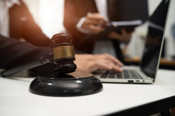 Judge gavel with Justice lawyers having team Concepts of Law and Legal services