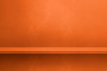 Naklejka premium Empty shelf on a neon orange concrete wall. Background template. Horizontal mockup