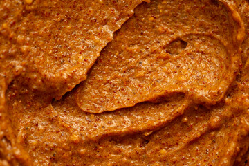 Baby food, vegetable puree close-up. Apple-carrot puree chopped in a blender. Background texture of food for newborn children.