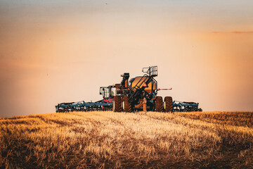 combine harvester on field