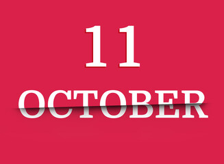 11 october calendar date white, cut in half. Viva magenta background, trend color 2023
