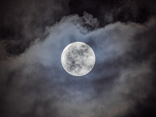 full moon over clouds