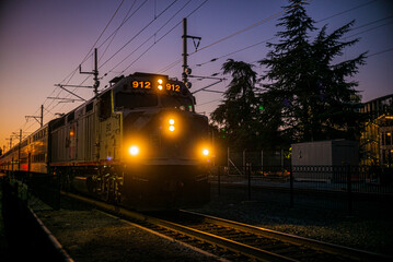 Fototapeta premium train in the night at a platform