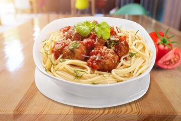 Spicy tasty noodles dish in white plate.