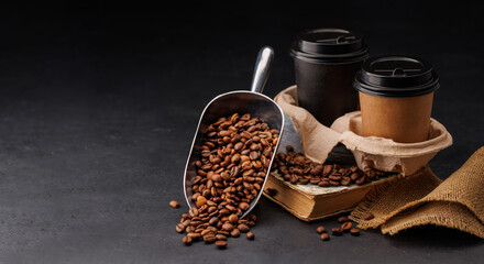 Rich coffee in a cup with aromatic roasted beans