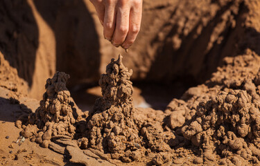 Sand towers on the seashore.