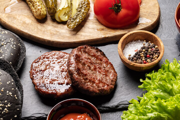 Homemade beef burgers cooking