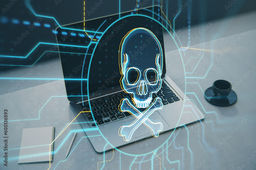 Poster close up of laptop on desk with notepad, coffee cup and digital skull hologram on blurry background.