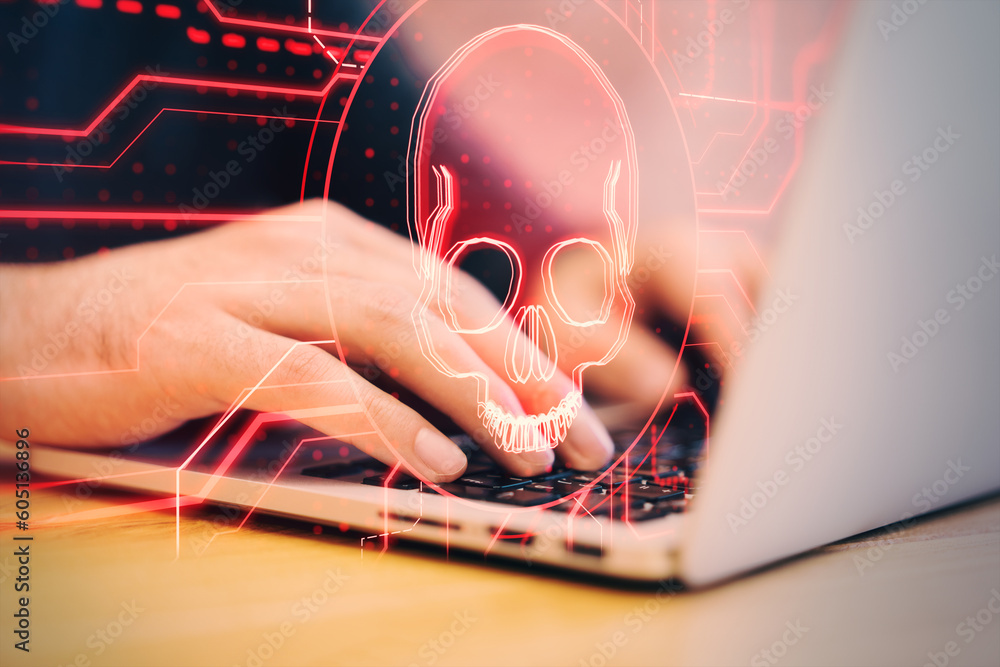 Poster close up of male hands using laptop with digital skull hologram on blurry background. hacking, malwa