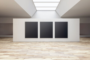 Bright grey gallery room interior with three blank black posters and wooden floor. Gallery, exhibition, advertising concept. Mockup, 3D Rendering