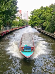 Naklejka premium City people use faster boat services than traffic jam on the Bangkok road.